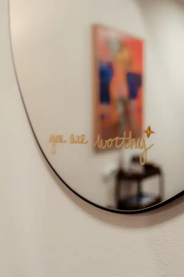 Dermatology Treatment In Waunakee, WI 34 Clinic room with you are worthy mirror at Loure Aesthetics